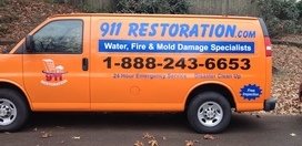 Mold and Water Damage Restoration Vehicle En Route To Job